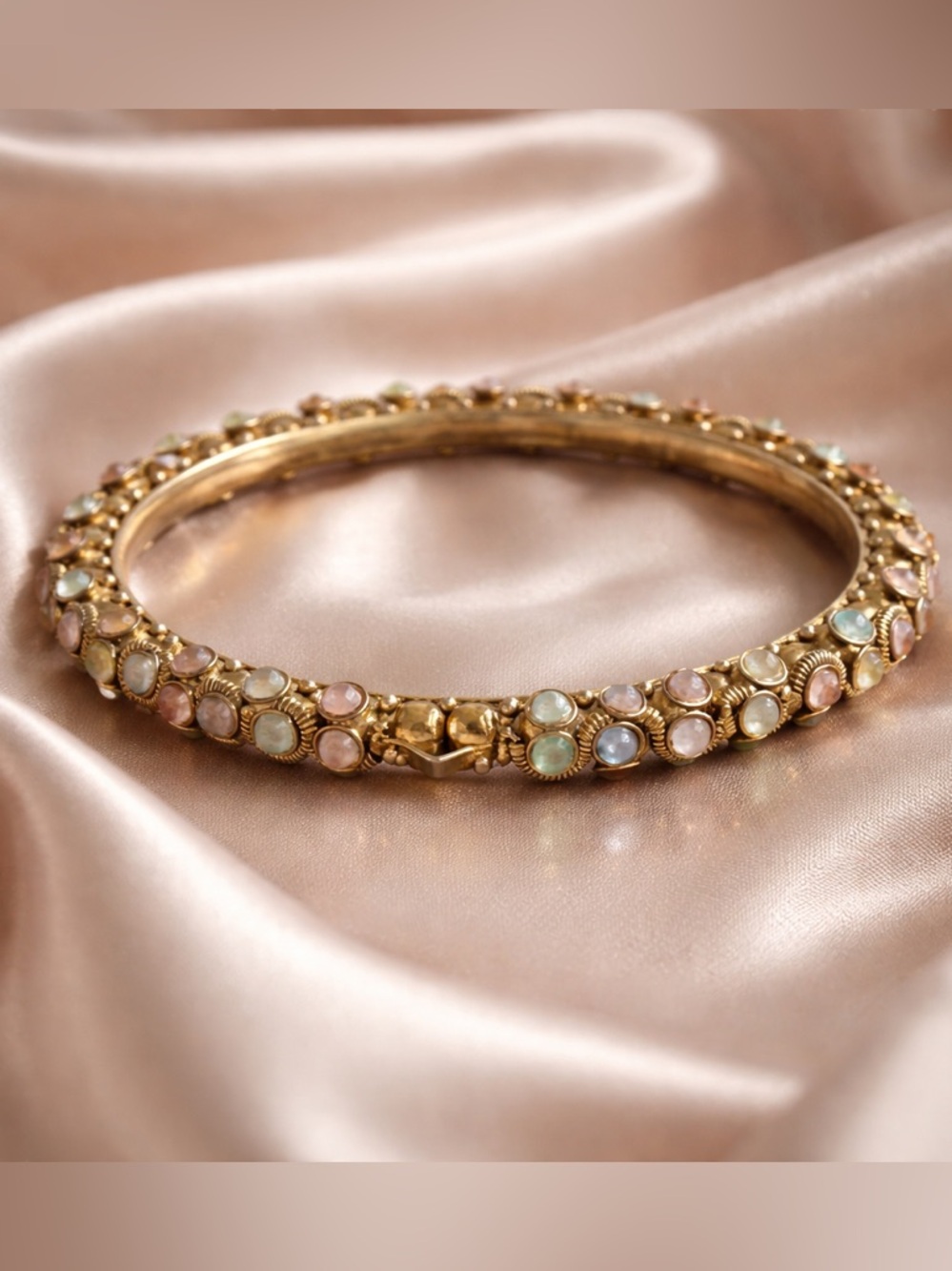 Vintage gold tone bracelet with multi coloured stones